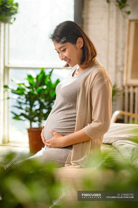 pregnant asians|Pregnant Asians Pictures, Images and Stock Photos.